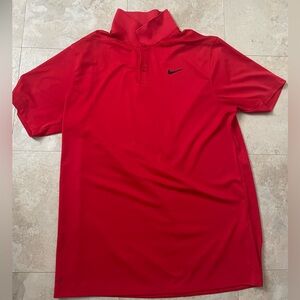 Large red Nike golf polo for outdoor and indoor activities